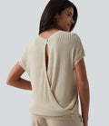 Pull casual col rond manches chauve-souris croisé dos nu