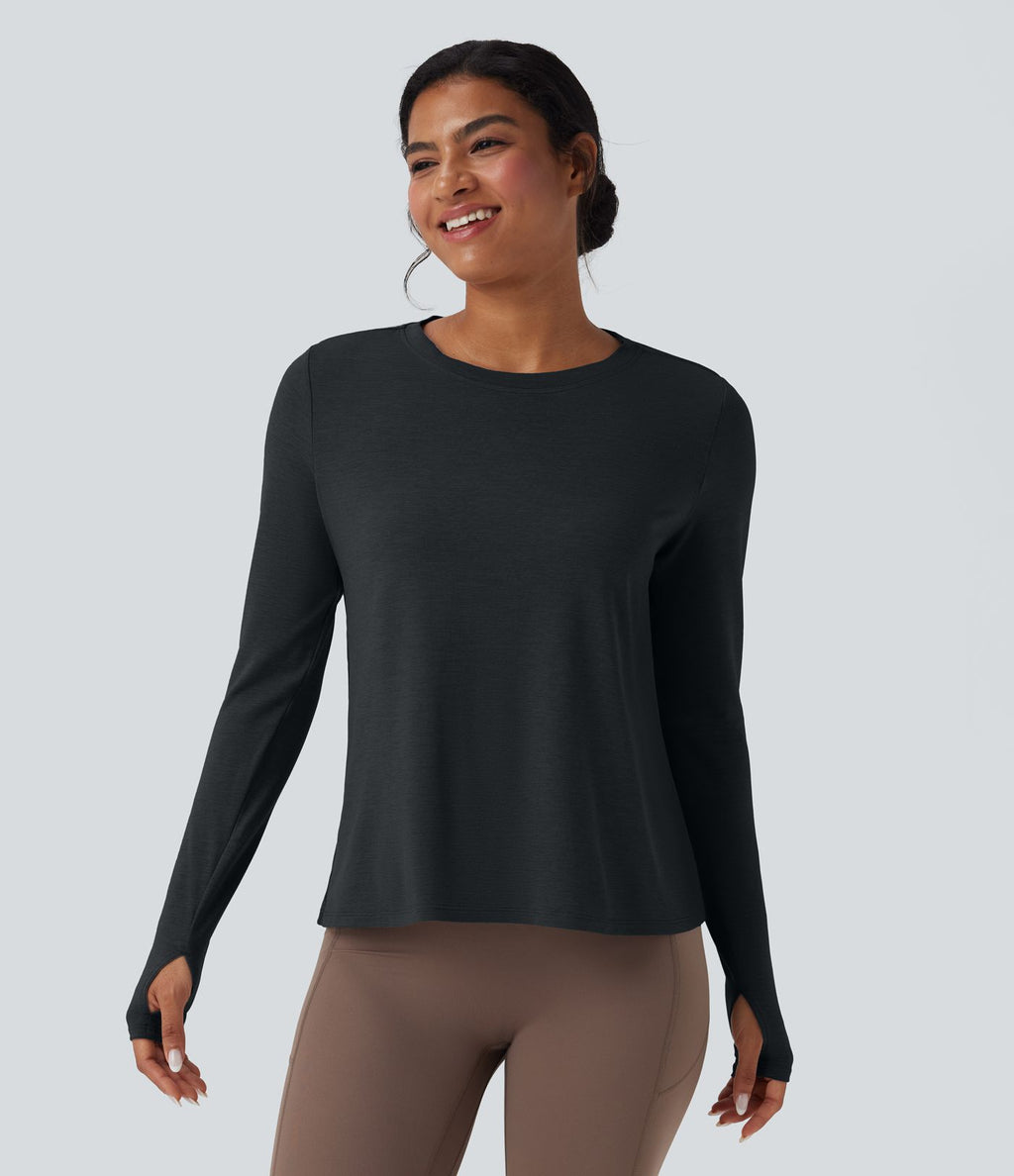Haut de sport yoga dos nu manches longues avec trous pouces