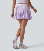 Jupe mini de tennis plissée 2-en-1 Breezeful™ color block taille haute à séchage rapide avec poches