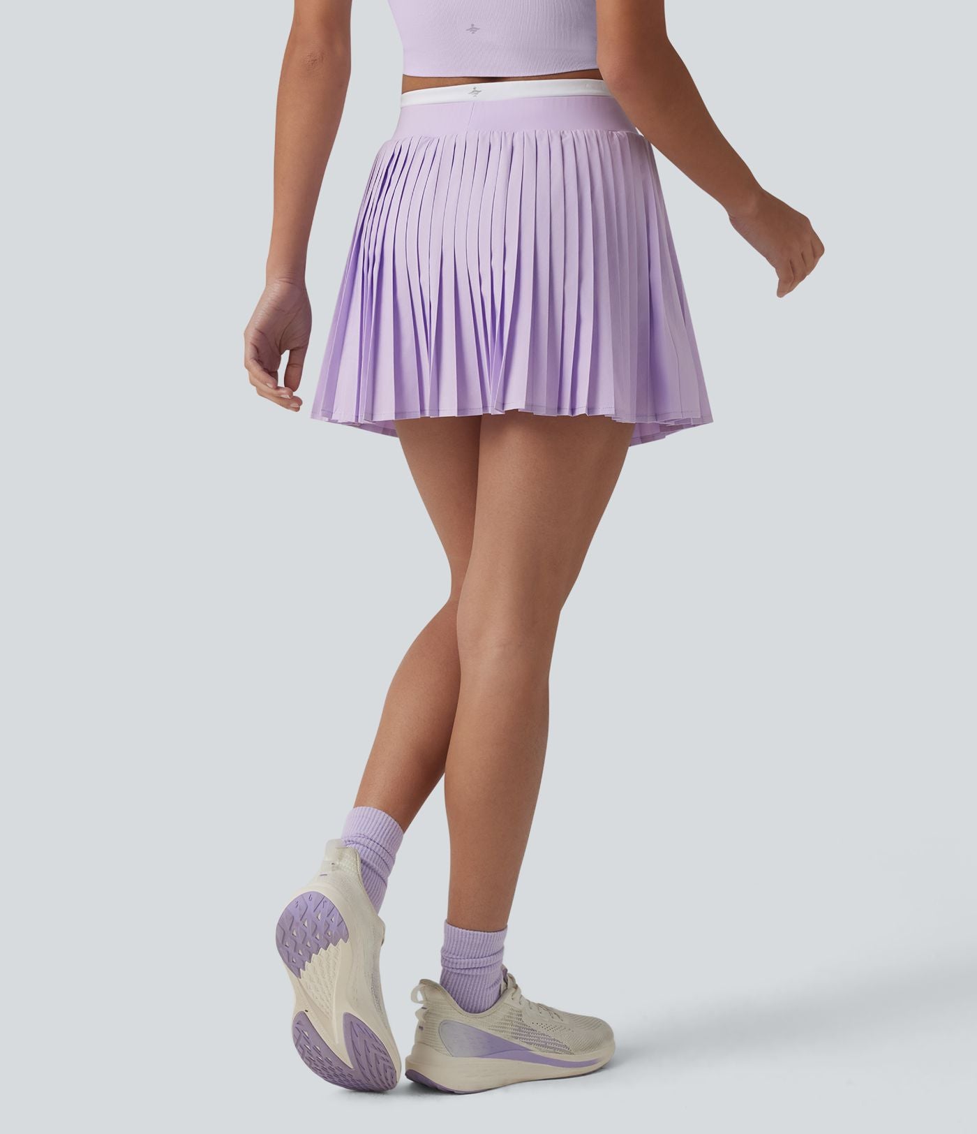 Jupe mini de tennis plissée 2-en-1 Breezeful™ color block taille haute à séchage rapide avec poches