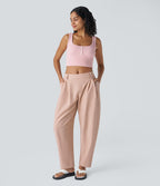 Pantalon tailleur ample, taille moyenne, coupe barrel, à poches