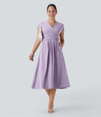 Robe midi Breezeful™ col V manches courtes à liens dans le dos séchage rapide avec poches latérales