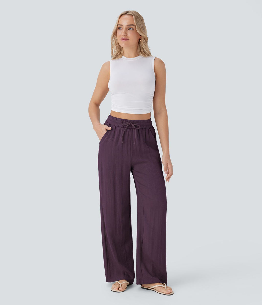 Pantalon large fluide taille haute avec cordon de serrage, poches latérales et aspect lin