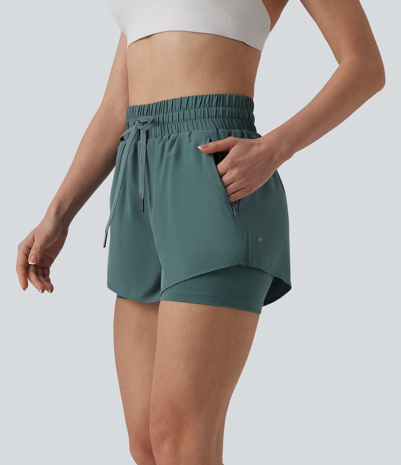 Short running 2-en-1 taille haute avec cordon de serrage et poches
