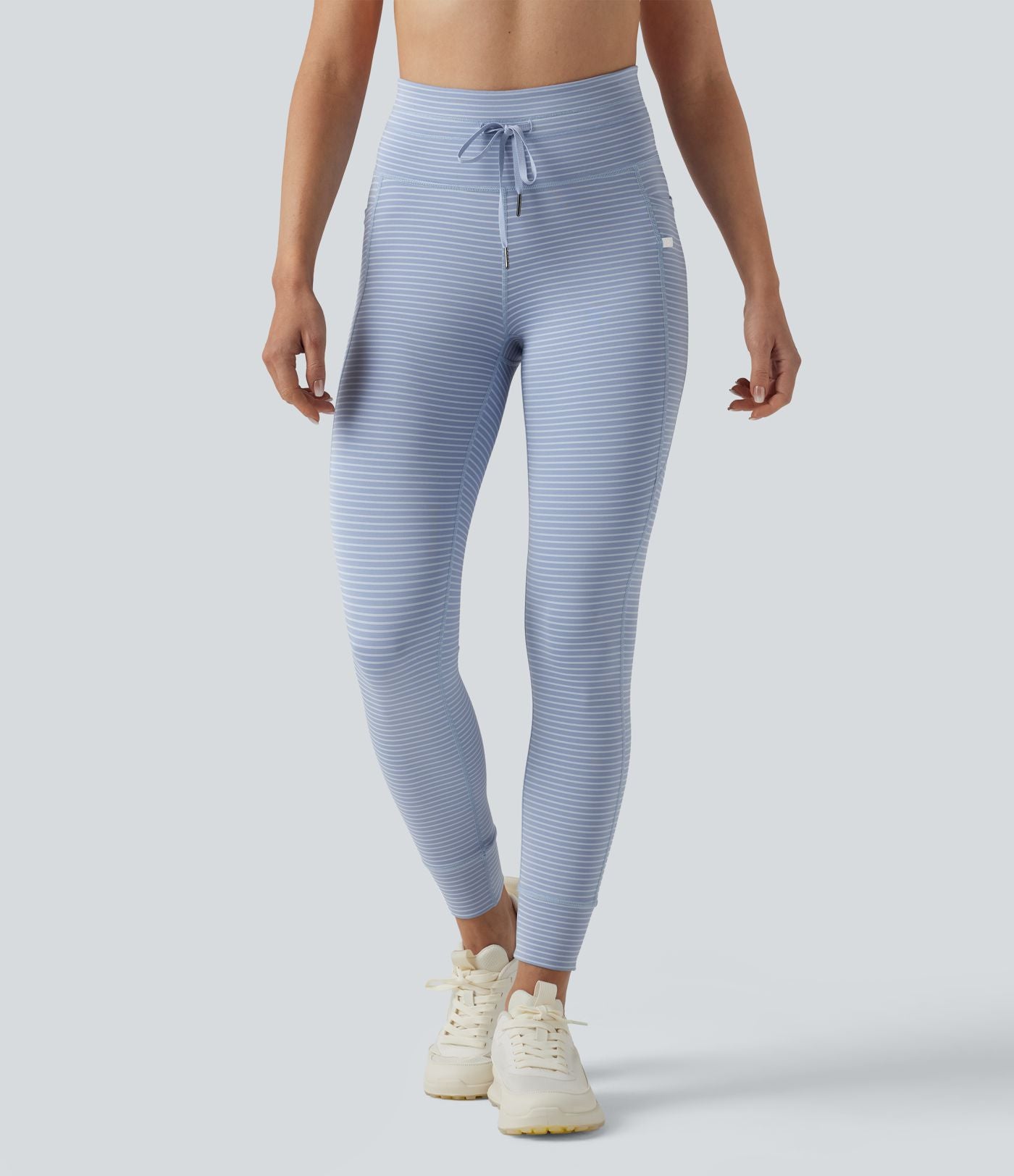 Legging de yoga rayé taille haute avec cordon de serrage et poches