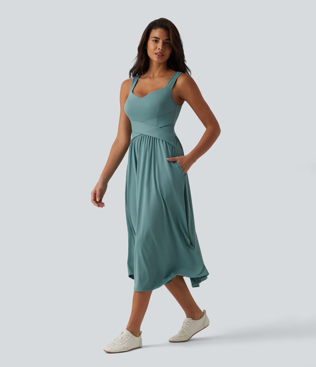 Robe midi fluide sans manches dos croisé, avec brassière intégrée (Bonnets E-G) et poches