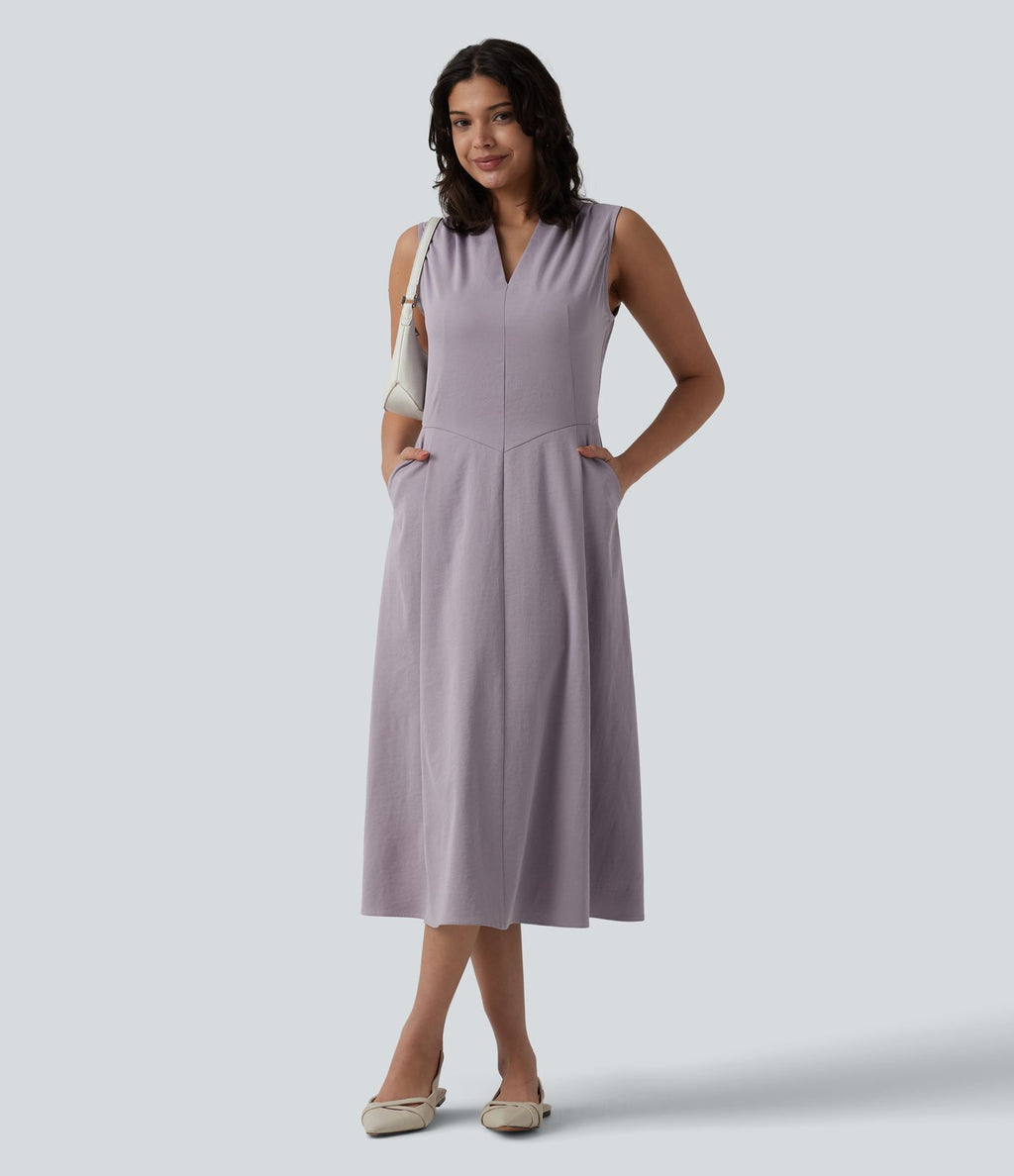 Robe mi-longue plissée col V sans manches avec fermeture éclair invisible et poches pour le travail