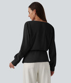 Blouse esprit bureau défroissage facile, col V cache-cœur avec boutons-pression, manches longues et coupe ample