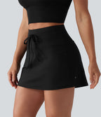 Jupe de tennis SoftlyZero™ Airy mini 2-en-1 gainante taille haute à cordon de serrage et effet frais InstantCool avec poches