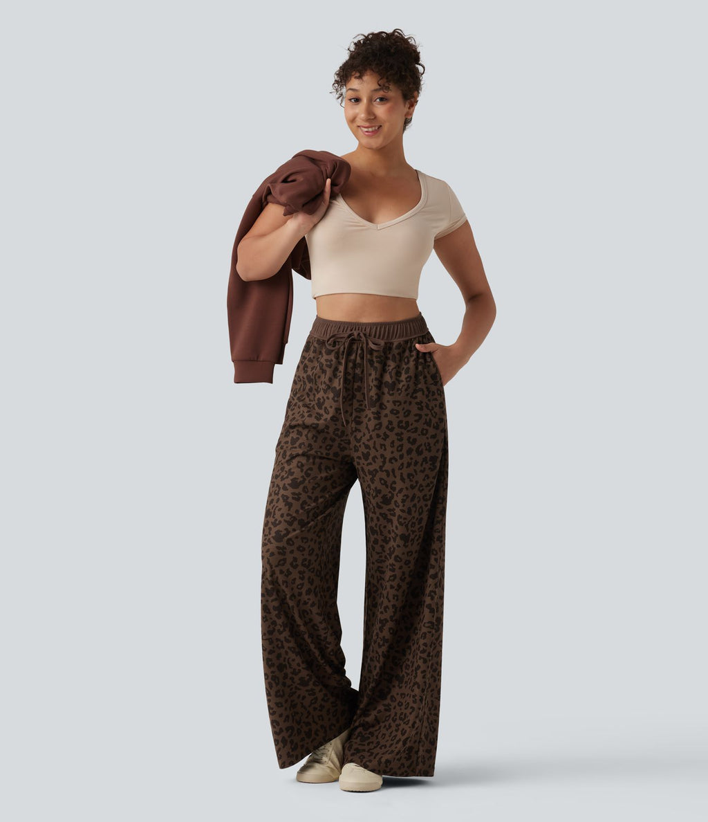 Pantalon casual large gaufré imprimé léopard taille haute avec cordon de serrage et poches