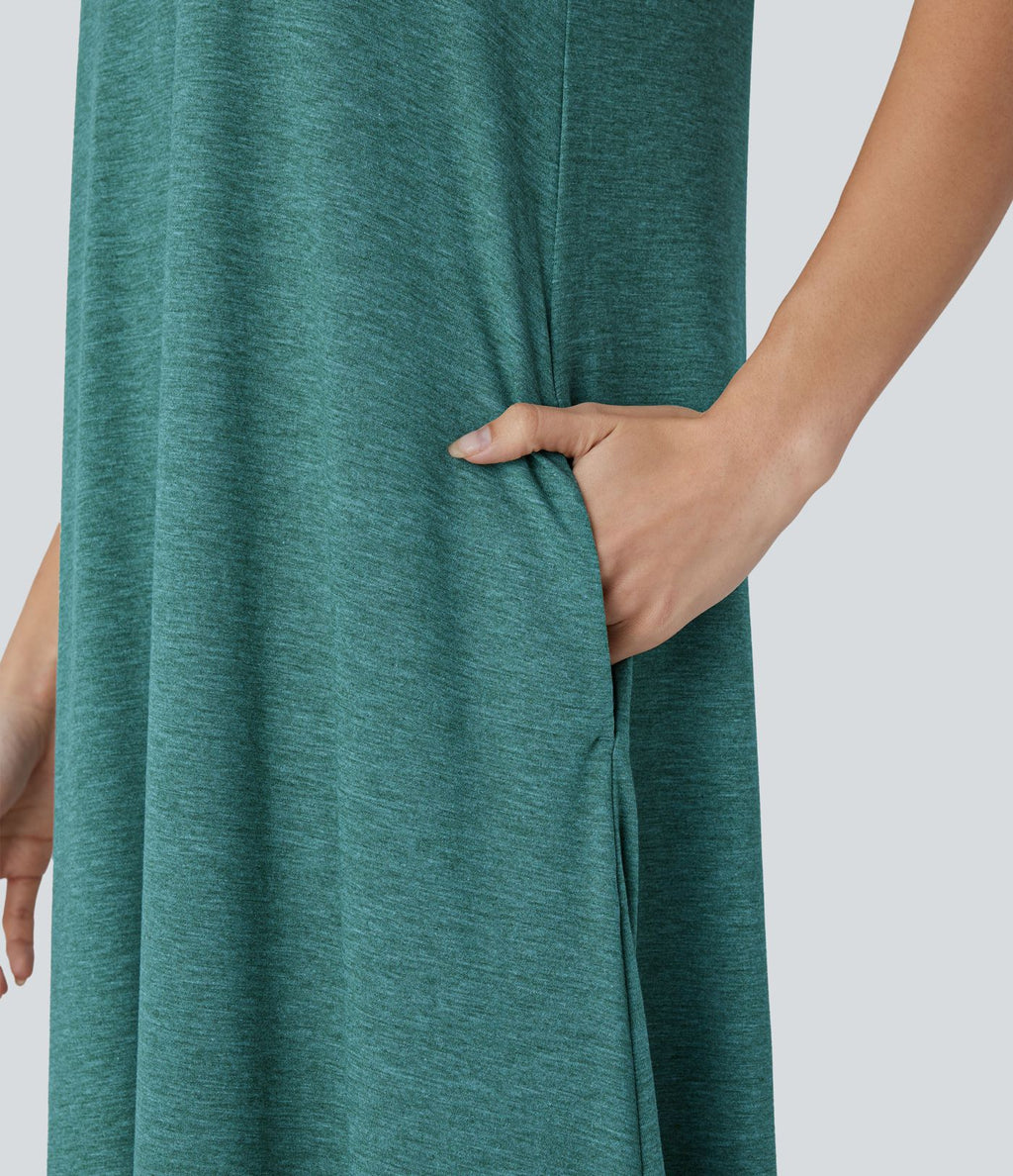 Robe longue décontractée fluide à col rond, sans manches, poches latérales et ourlet asymétrique