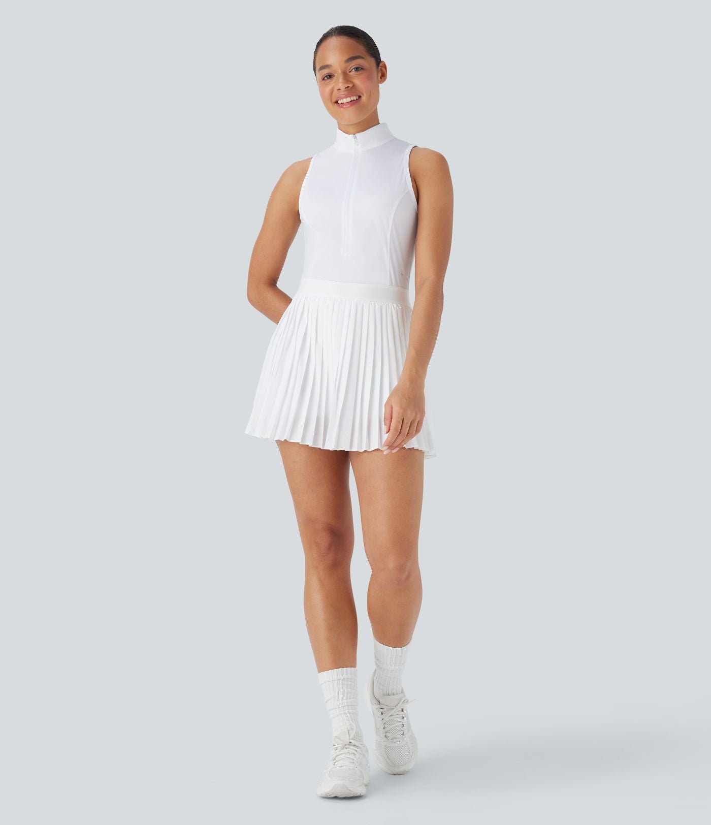 Robe de tennis courte 2-en-1 sans manches ajourée plissée à séchage rapide Breezeful™ avec poches latérales