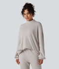 Sweat-shirt gaufré col montant manches longues coupe décontractée avec poches