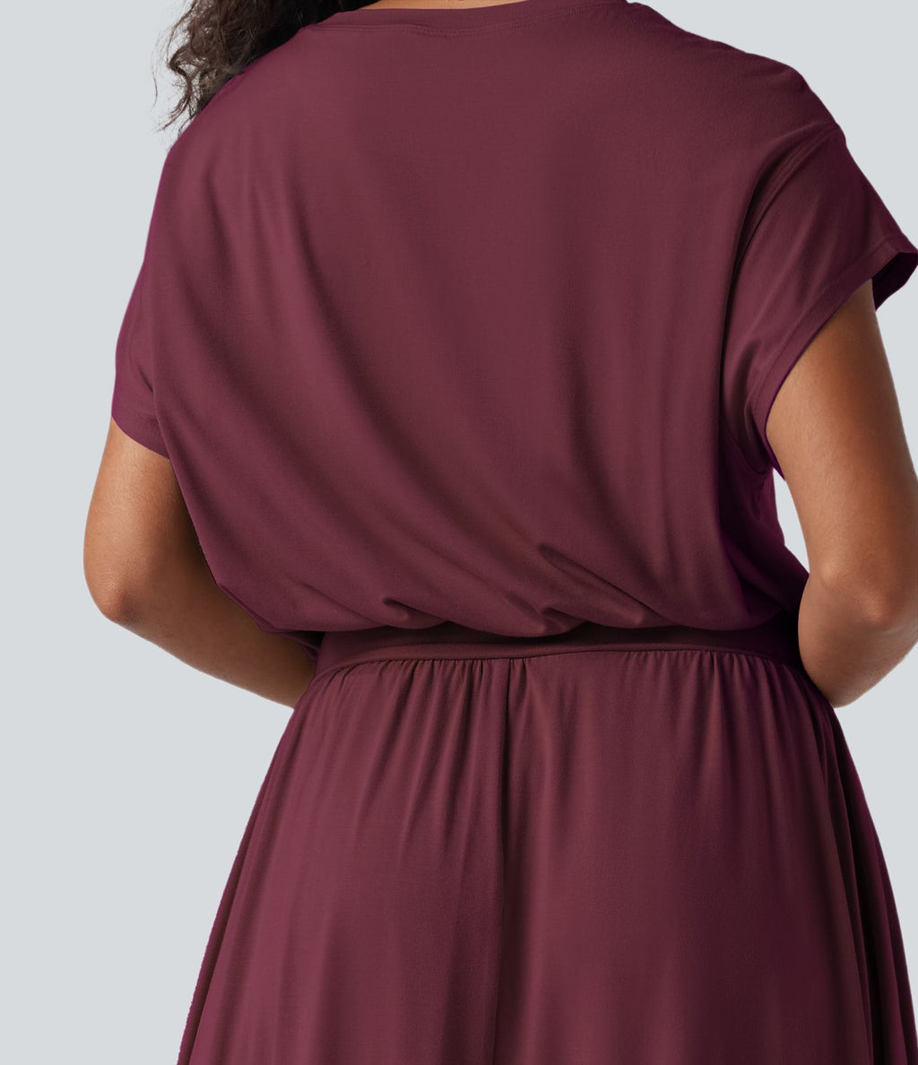 Robe de travail mi-longue fluide gainante à manches chauve-souris avec poches
