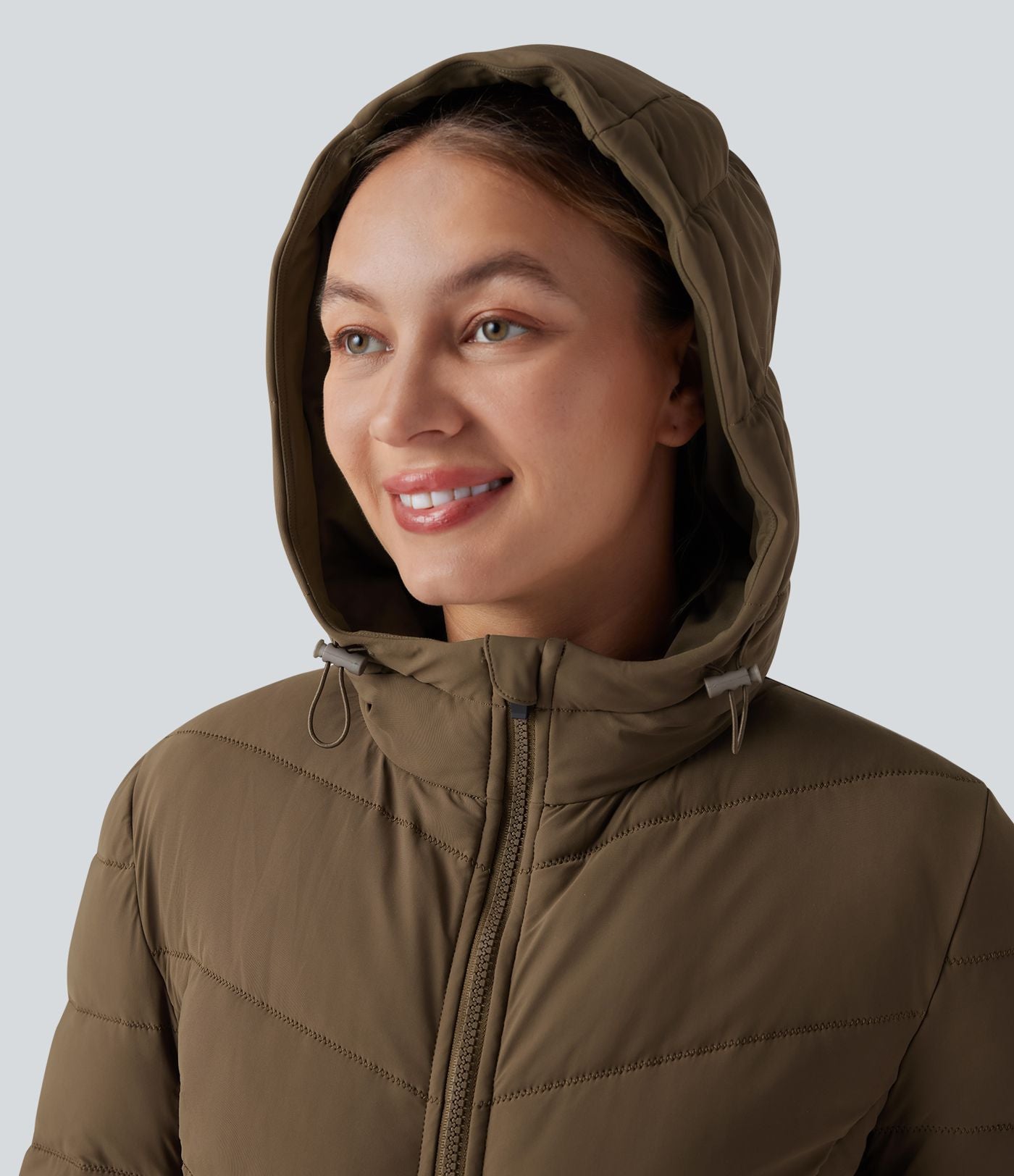Doudoune longue extensible PuffFlex à capuche avec poches
