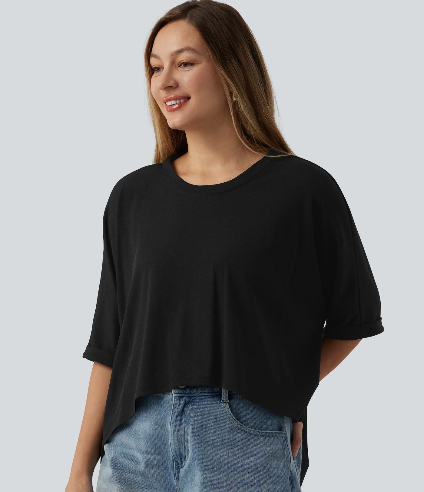 T-shirt décontracté col rond manches mi-longues ourlet asymétrique