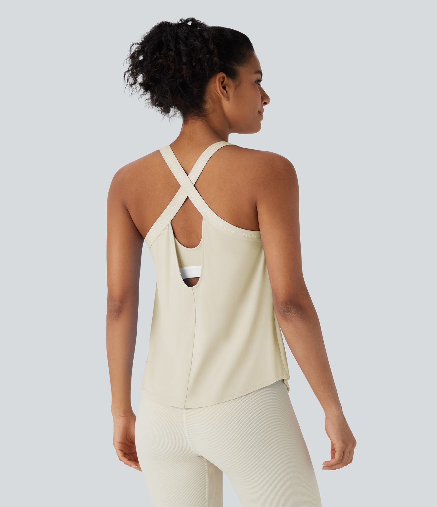 Débardeur yoga dos nu col U avec bretelles croisées, ourlet arrondi et effet frais InstantCool, protection solaire UPF50+