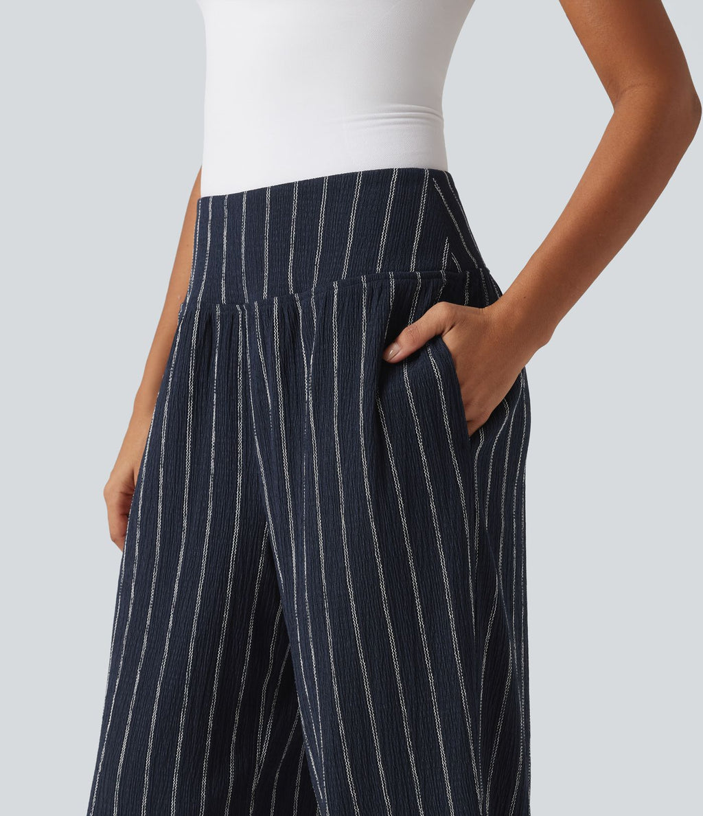 Pantalon rayé taille haute avec ourlet arrondi et poches