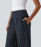 Pantalon rayé taille haute avec ourlet arrondi et poches