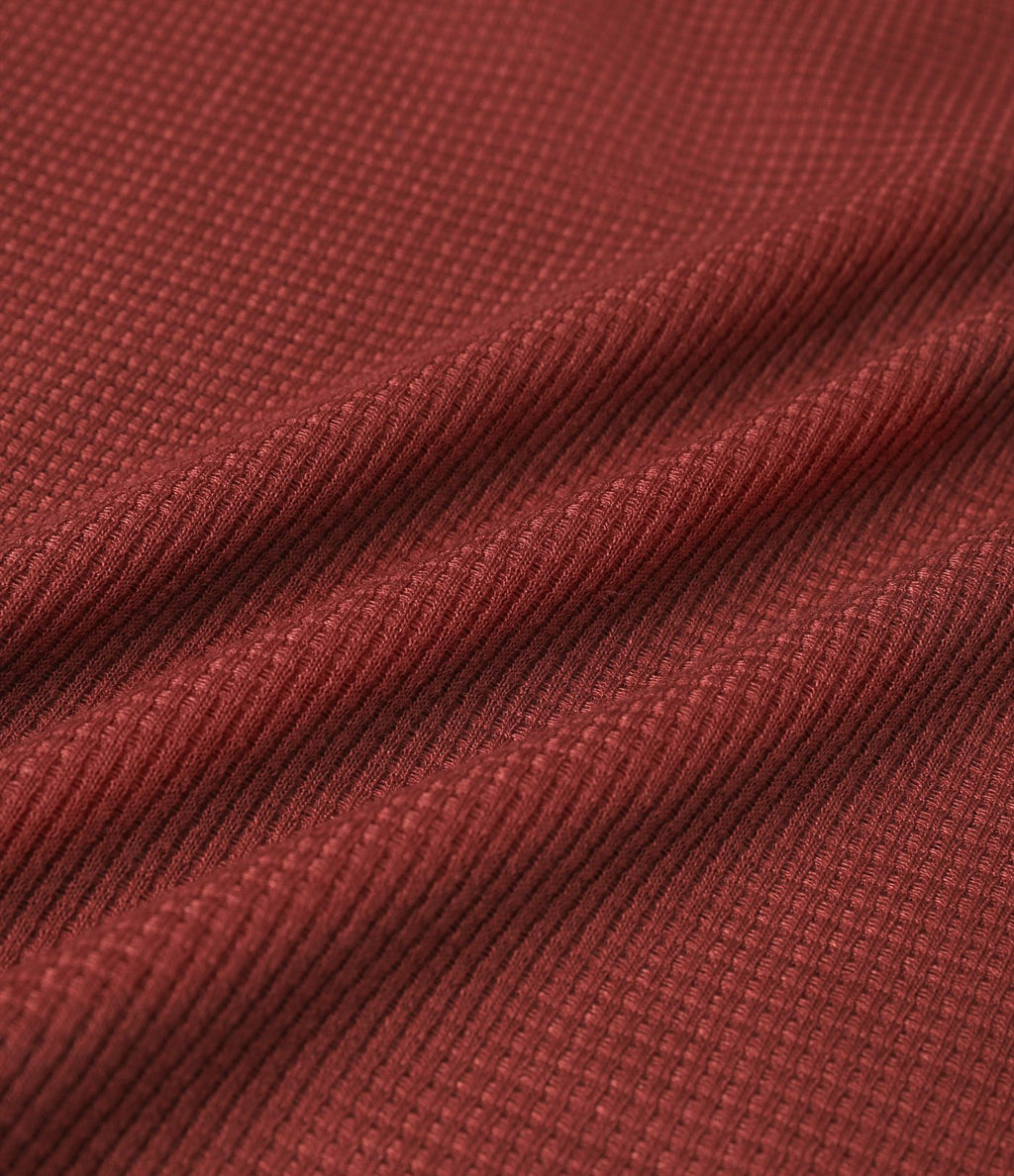 Top gaufré à capuche col Henley manches longues