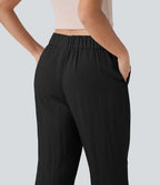 Jogging fuselé taille mi-haute à cordon avec poches