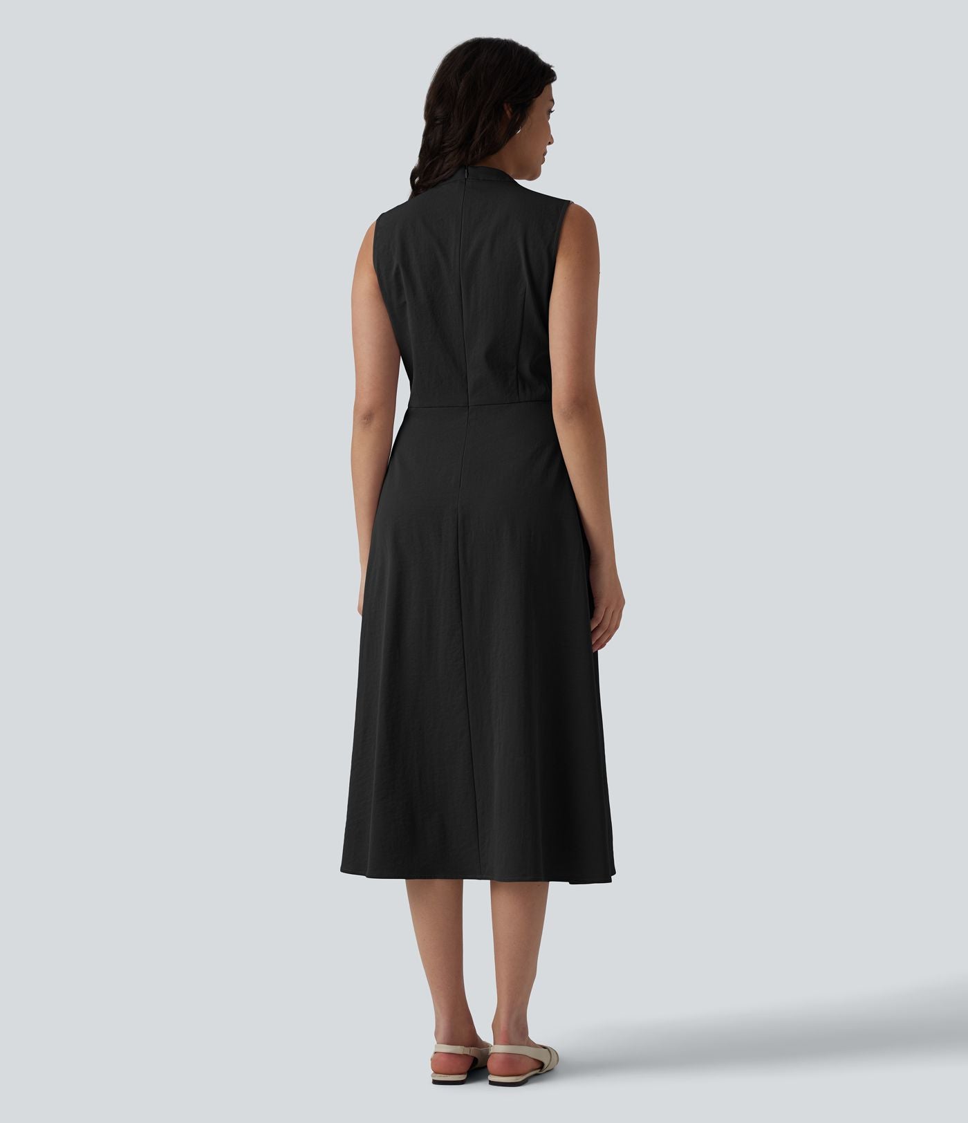 Robe mi-longue plissée col V sans manches avec fermeture éclair invisible et poches pour le travail