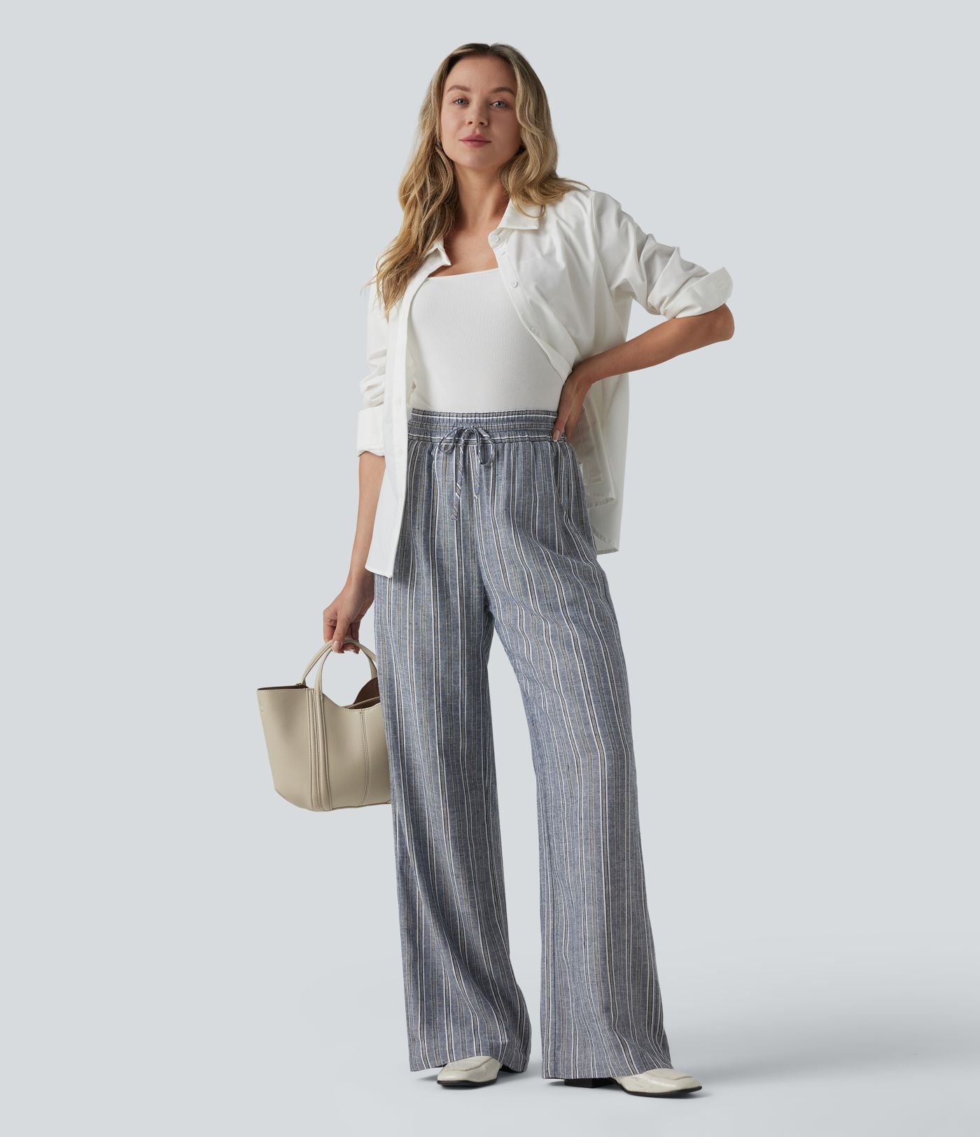 Pantalon tailleur large en lin rayé taille haute avec cordon de serrage et poches