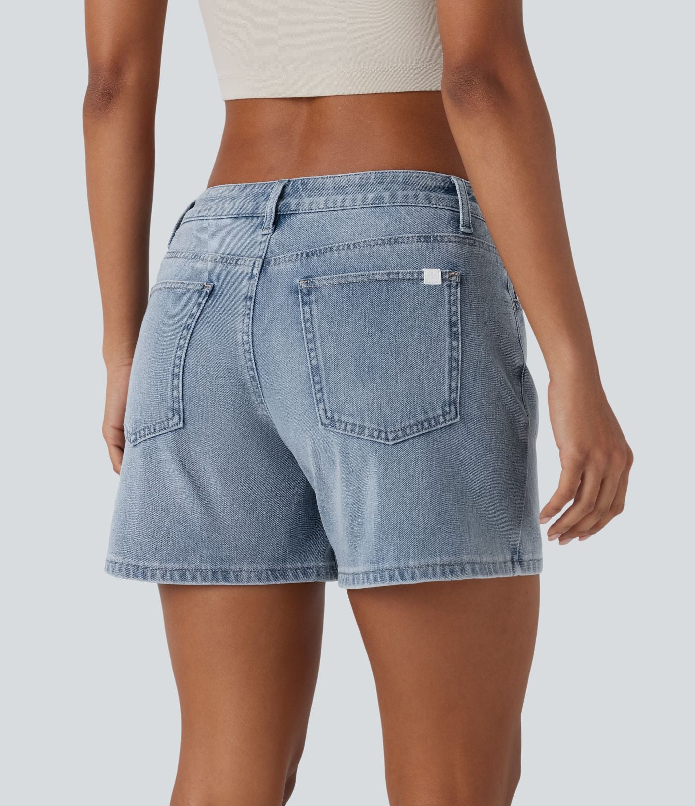 Short asymétrique en jean délavé Halara Flex™ taille basse à poches multiples
