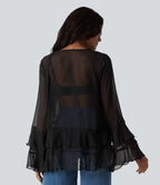 Chemise casual transparente col V manches longues à volants