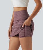 Mini-jupe de golf 2 en 1 à rayures, taille ultra haute, effet ventre plat, ourlet arrondi et poches