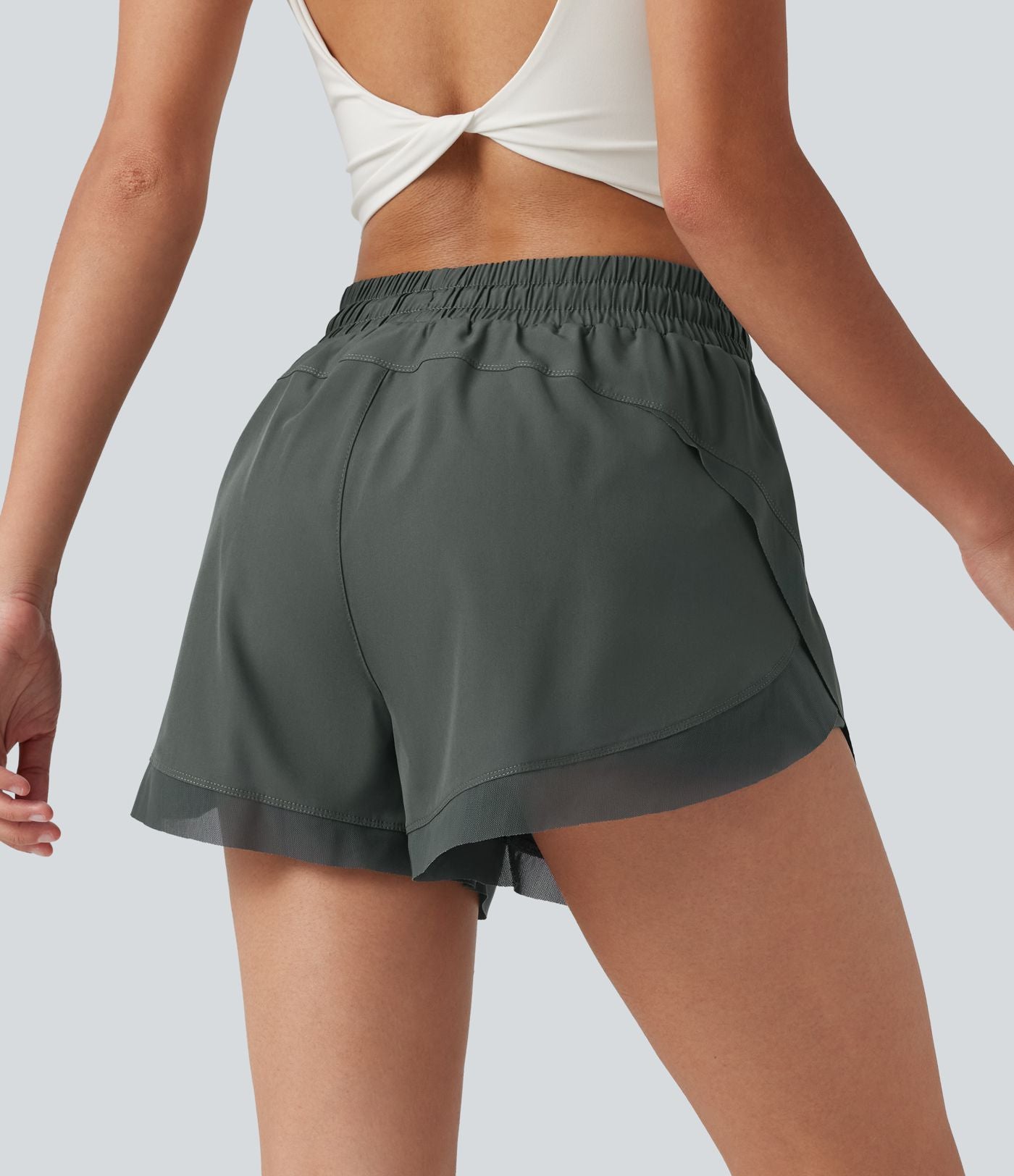 Short de running 2-en-1 taille mi-haute 7,5 cm avec cordon, ourlet incurvé, mesh contrasté et poches