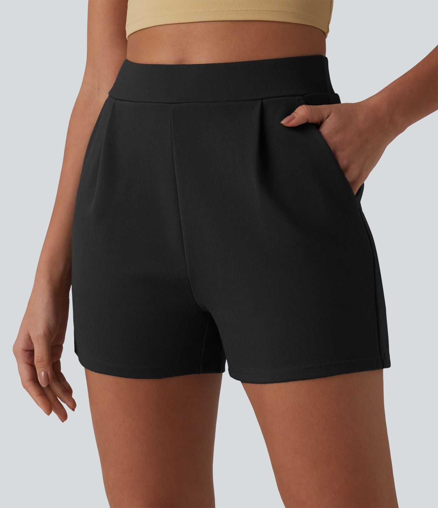 Short tailleur plissé taille haute avec poches