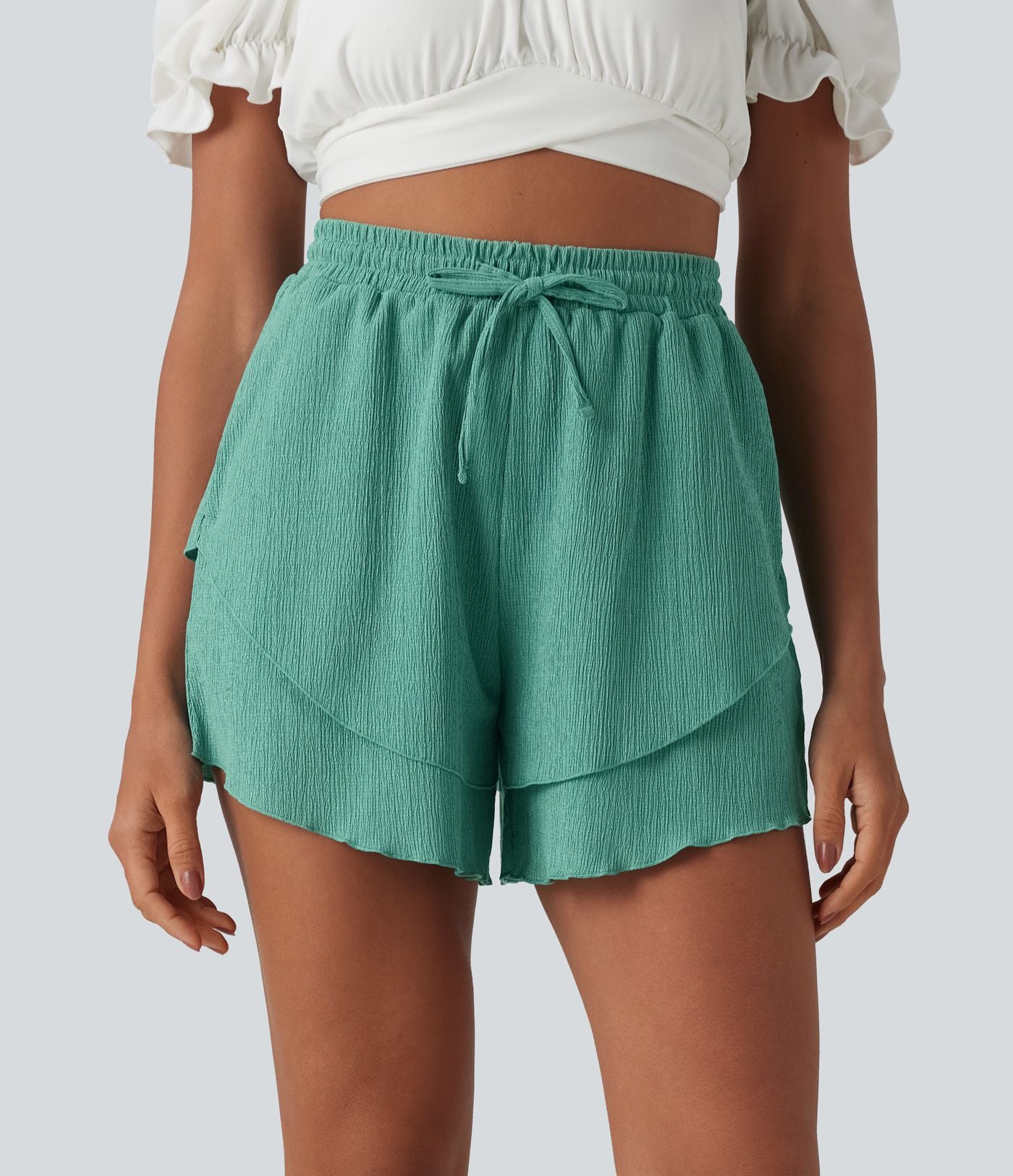 Short taille haute 12,5 cm à cordon de serrage et ourlet volants superposés avec poches