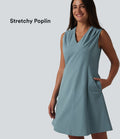 Robe de bureau mini en popeline stretch plissée col V sans manches avec fermeture éclair invisible et poches