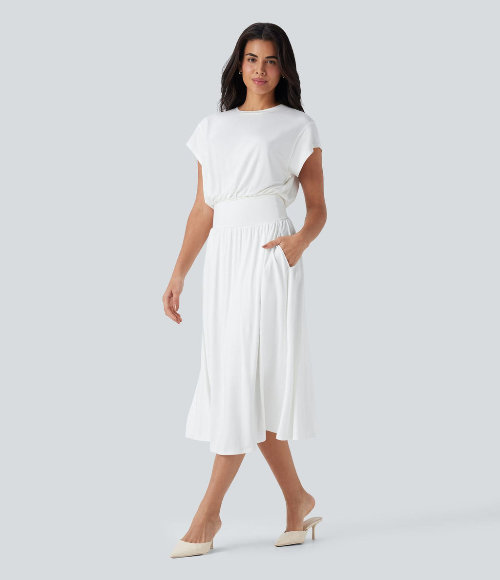 Robe de travail mi-longue fluide gainante à manches chauve-souris avec poches