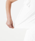 Blouse casual col rond avec découpe goutte d'eau au dos, dentelle contrastée et manches à volants