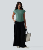 Blouse tailleur asymétrique col drapé manches courtes avec fronces et ourlet fendu