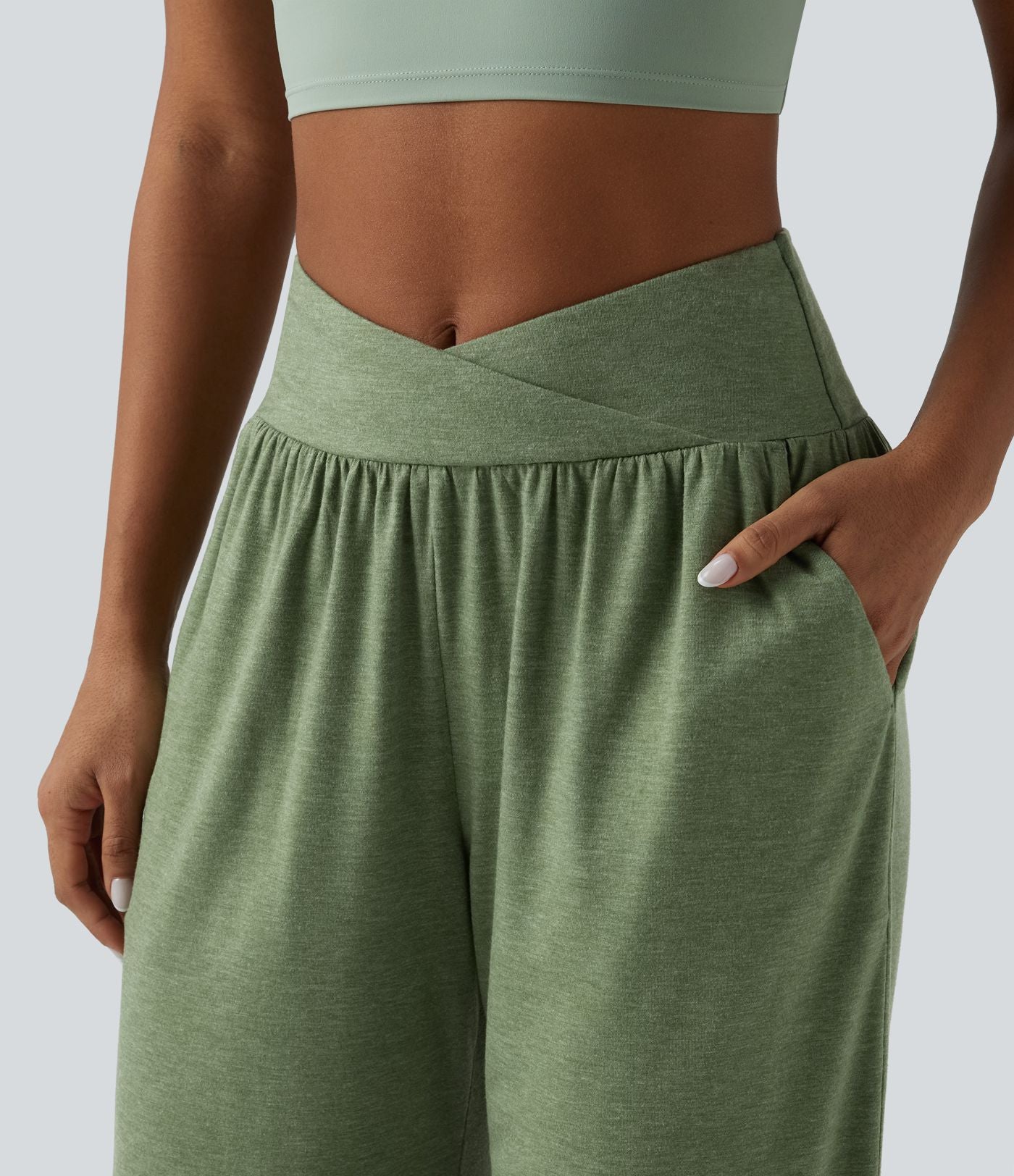Pantalon décontracté taille haute croisé à ourlet courbe avec poches