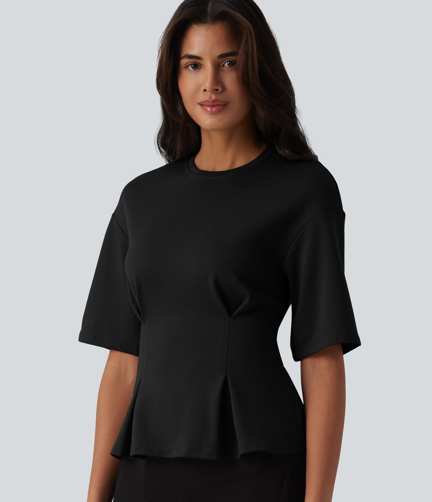 Blouse casual col rond taille cintrée à basque