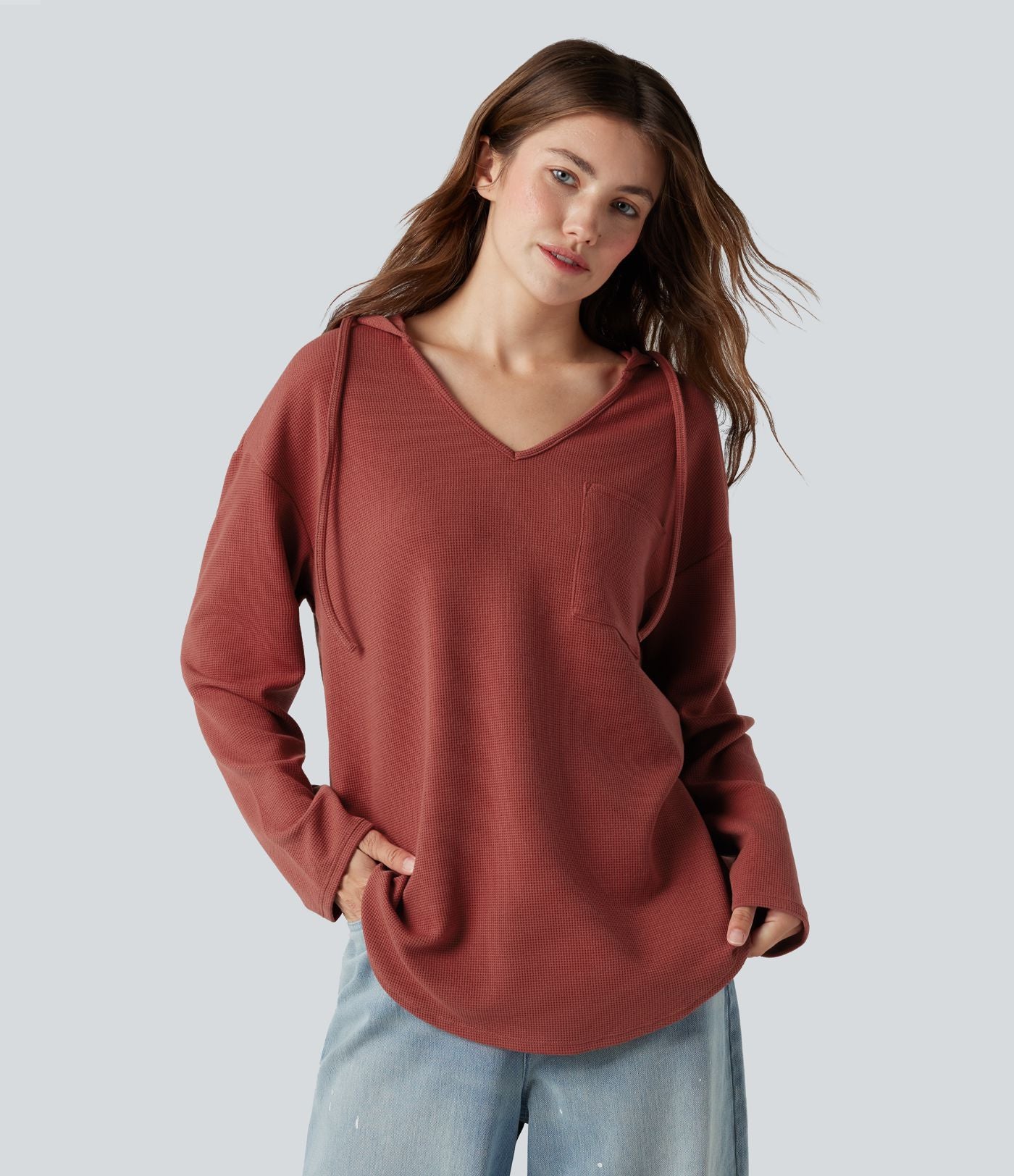 Sweat-shirt à capuche gaufré cordon de serrage manches longues ourlet arrondi avec poche