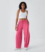 Pantalon Large Fluide Taille Mi-Haute Taille Élastique Cordon Poches Latérales Ourlet Flottant