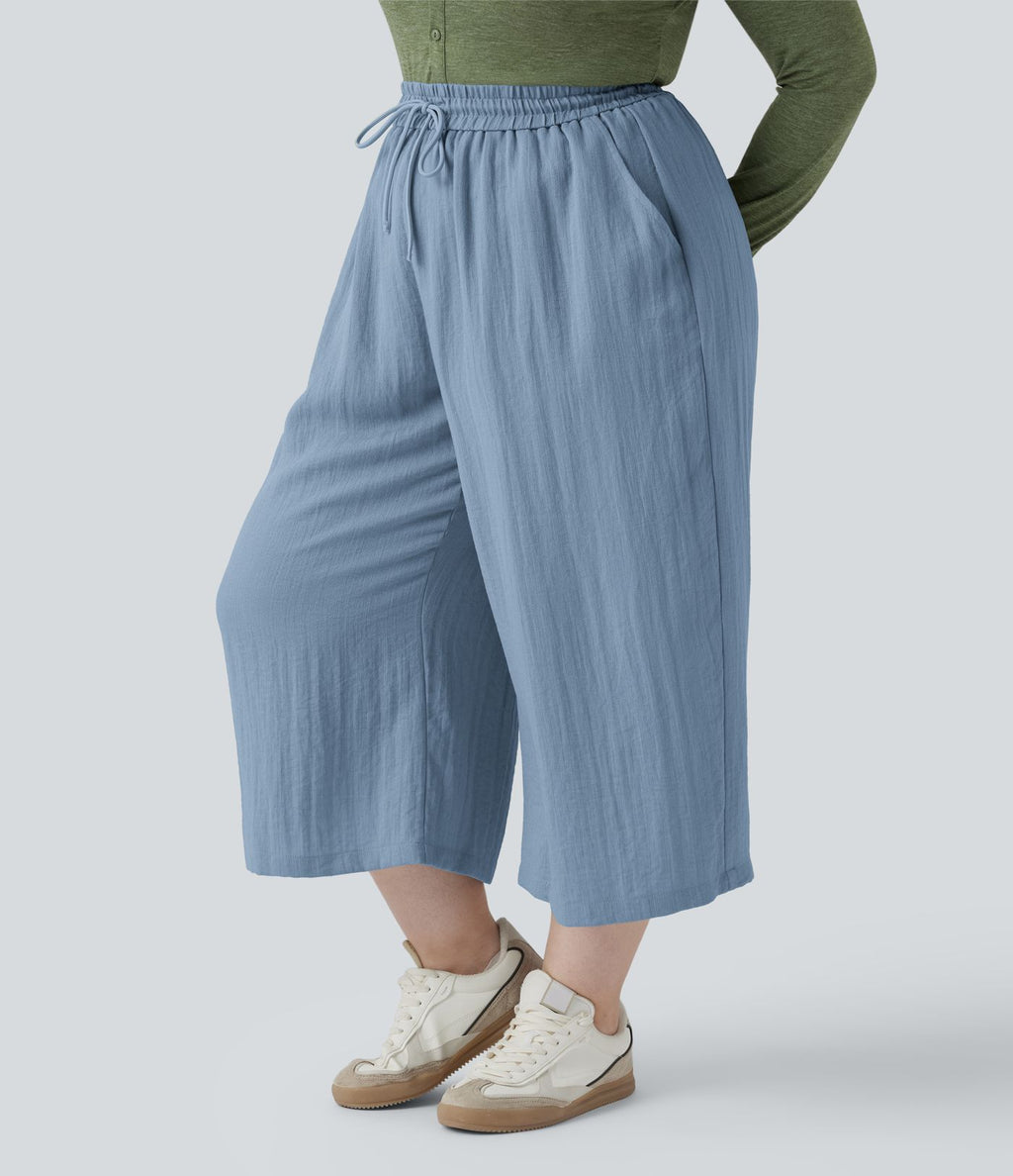 Pantalon grande taille large fluide taille haute avec cordon de serrage, poches et aspect lin