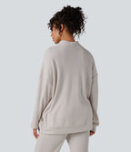 Sweat-shirt gaufré col montant manches longues coupe décontractée avec poches