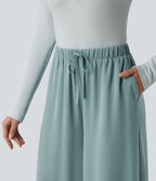 Pantalon large fluide décontracté taille haute effet lin avec cordon de serrage et poches