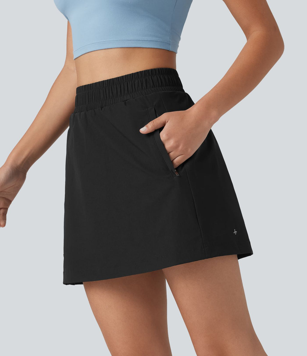 Jupe mini trapèze 2-en-1 taille haute avec boutons-pression et poches pour la randonnée