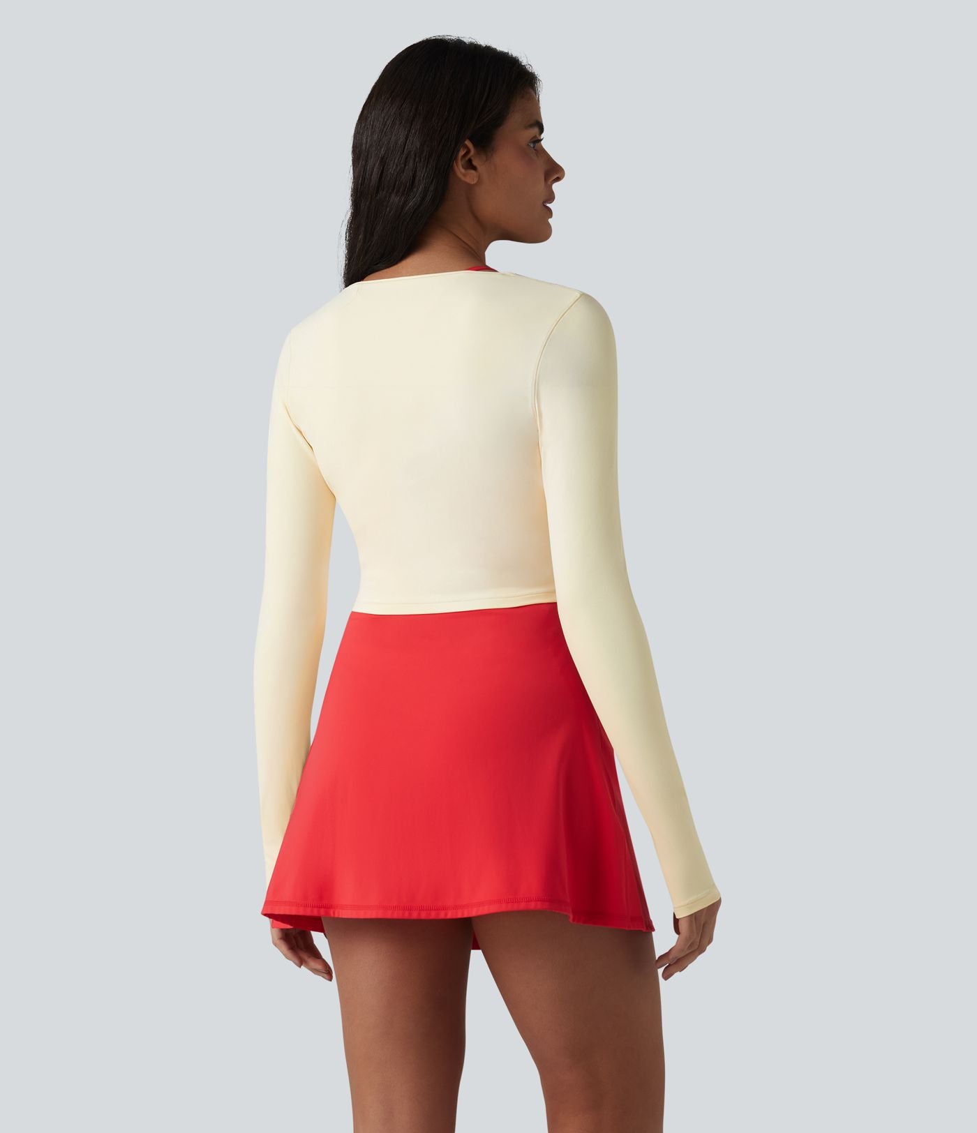 Haut de yoga court SoftlyZero™ Plush manches longues avec trous pour les pouces et nœud frontal