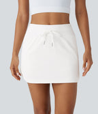 Softlyzero™ QuickDry Jupe de golf courte deux-en-un à taille haute avec poches latérales, ourlet arrondi, cordon de serrage - Poche pour tee de golf
