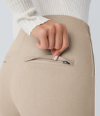 Pantalon tailleur skinny gainant taille haute à chevrons avec poches arrière zippées décoratives