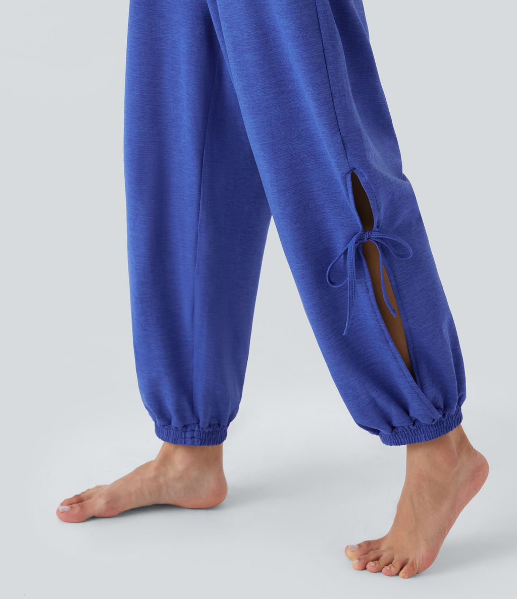 Combinaison de yoga sans manches dos nu à découpes avec cordon de serrage et poches