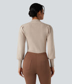 Pull col montant manches bouffantes longues
